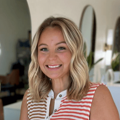 Portrait of Sophie, a professional stylist at Sisu Hair Studio, showcasing their expertise and style.