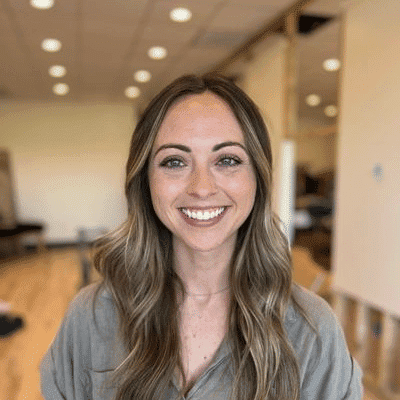 Portrait of Morgan, a professional stylist at Sisu Hair Studio, showcasing their expertise and style.